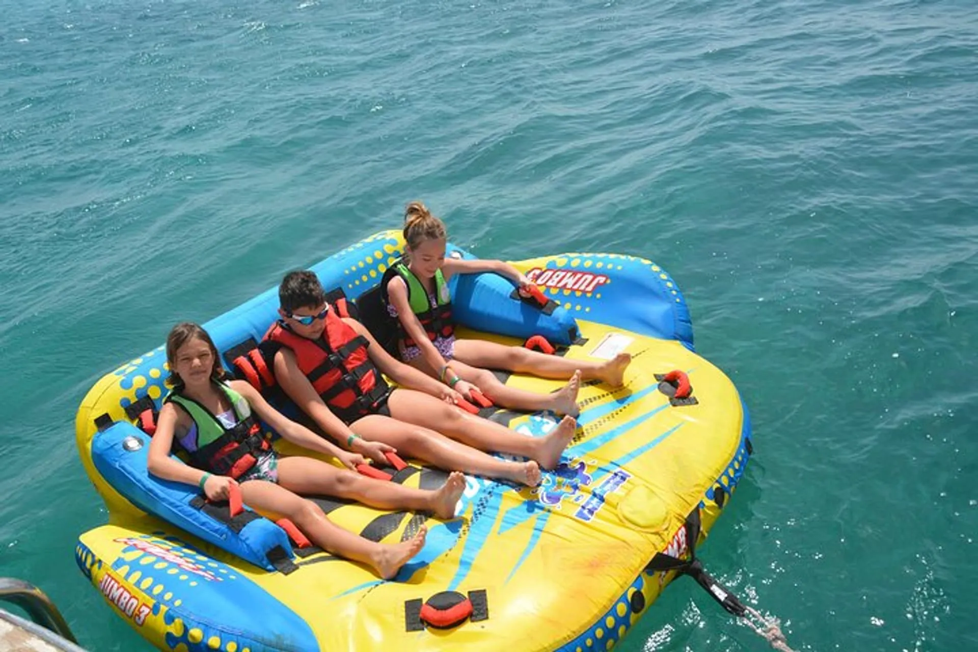 Banana boat ride in Hurghada with tourists enjoying speed on the Red Sea