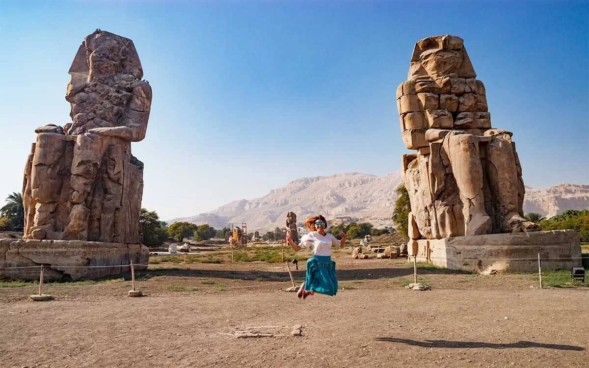 Ancient Colossi of Memnon statues on the west bank of Luxor, Egypt