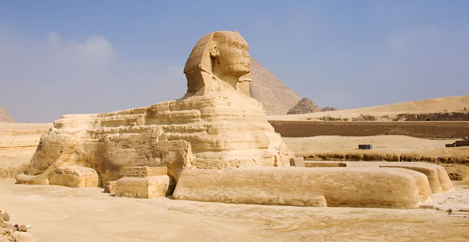 The Great Sphinx of Giza standing before the Pyramids of Giza